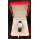 Lady's 18k CARTIER PARIS three colour gold Vendome wristwatch with brown leather strap,