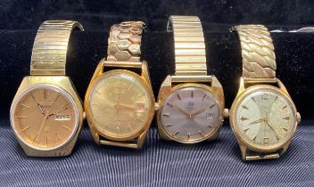 Four assorted watches including Camy 21 Jewels Sputnik watch with Camy centrepiece on reverse