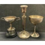 Two silver [hallmarked] trophies (1902 & 1923) and silver [hallmarked] candle stick holder with