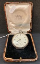 Silver [hallmarked] pocket watch - dated 1934 - with white enamel face and roman numerals (in