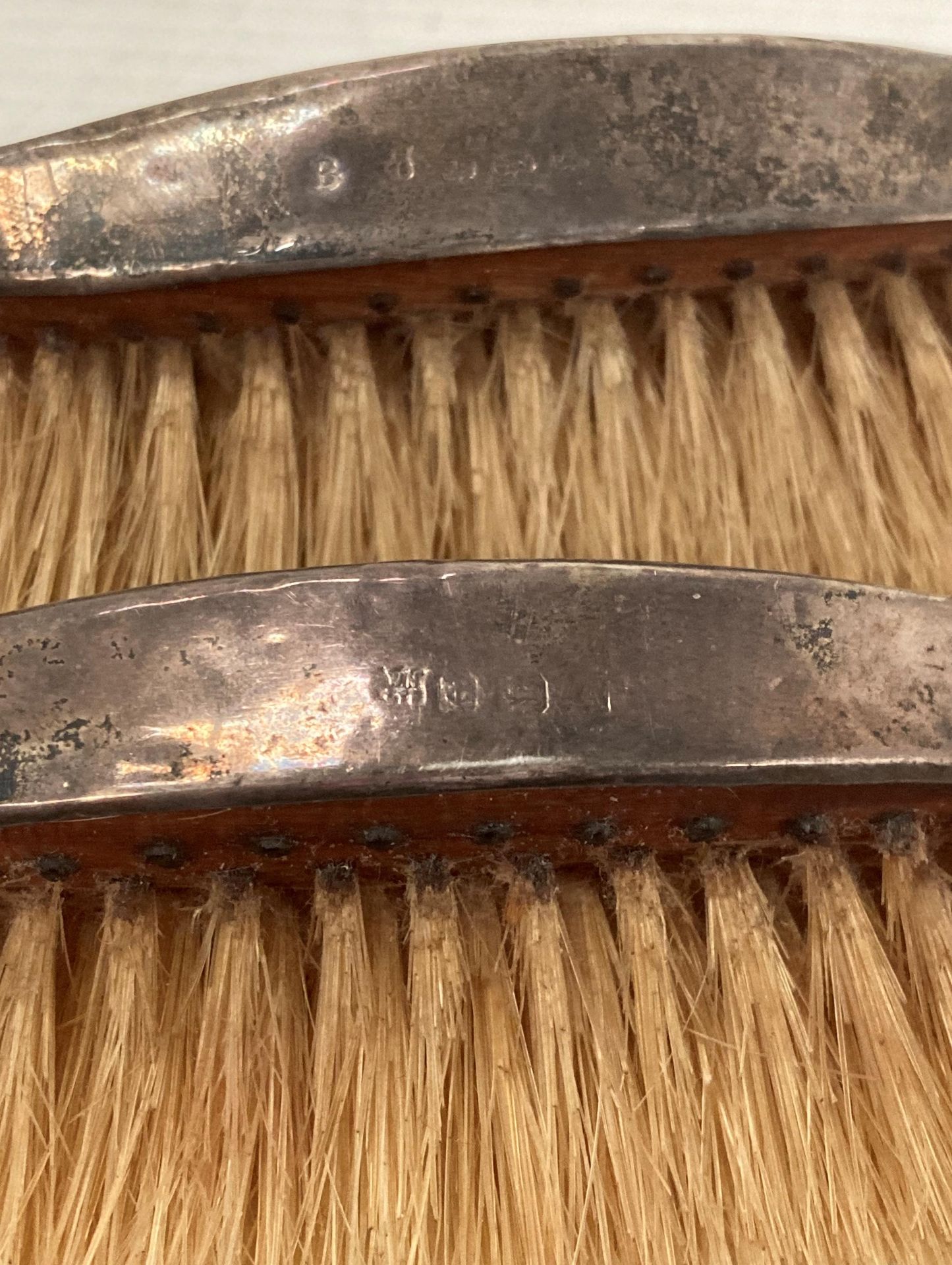 Five silver [hallmarked] items, two clothes brushes with matching comb, 1925, hair brush 1909, - Image 2 of 4