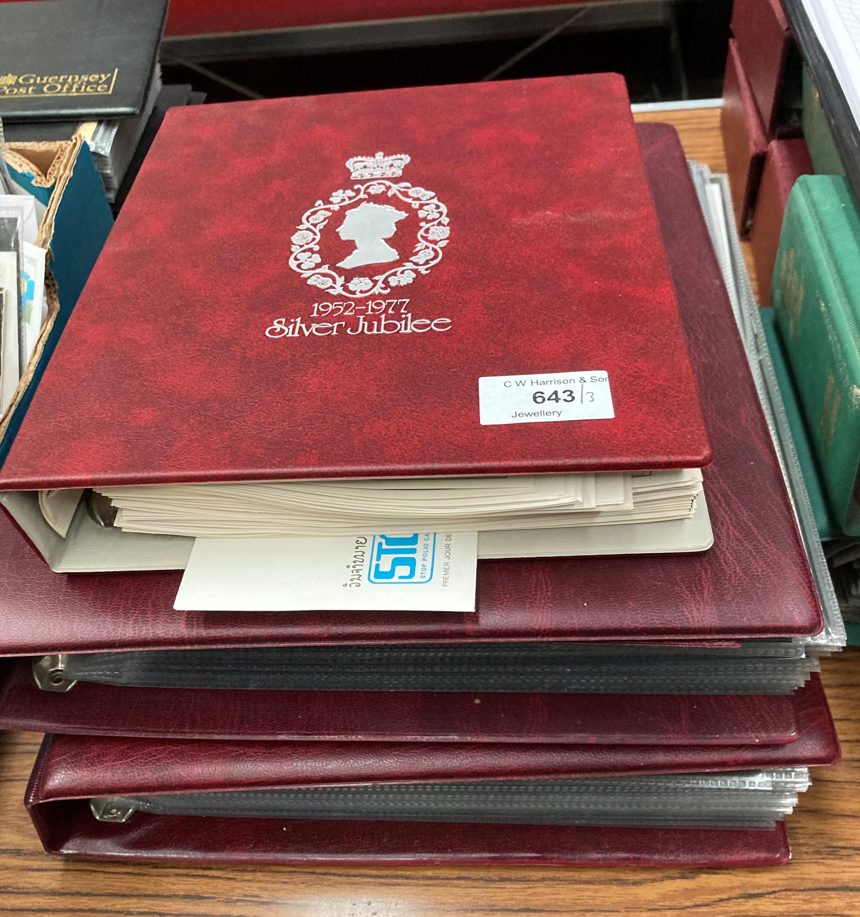 Two files containing Royal Mint First Day Covers and a file containing Commonwealth Silver Jubilee