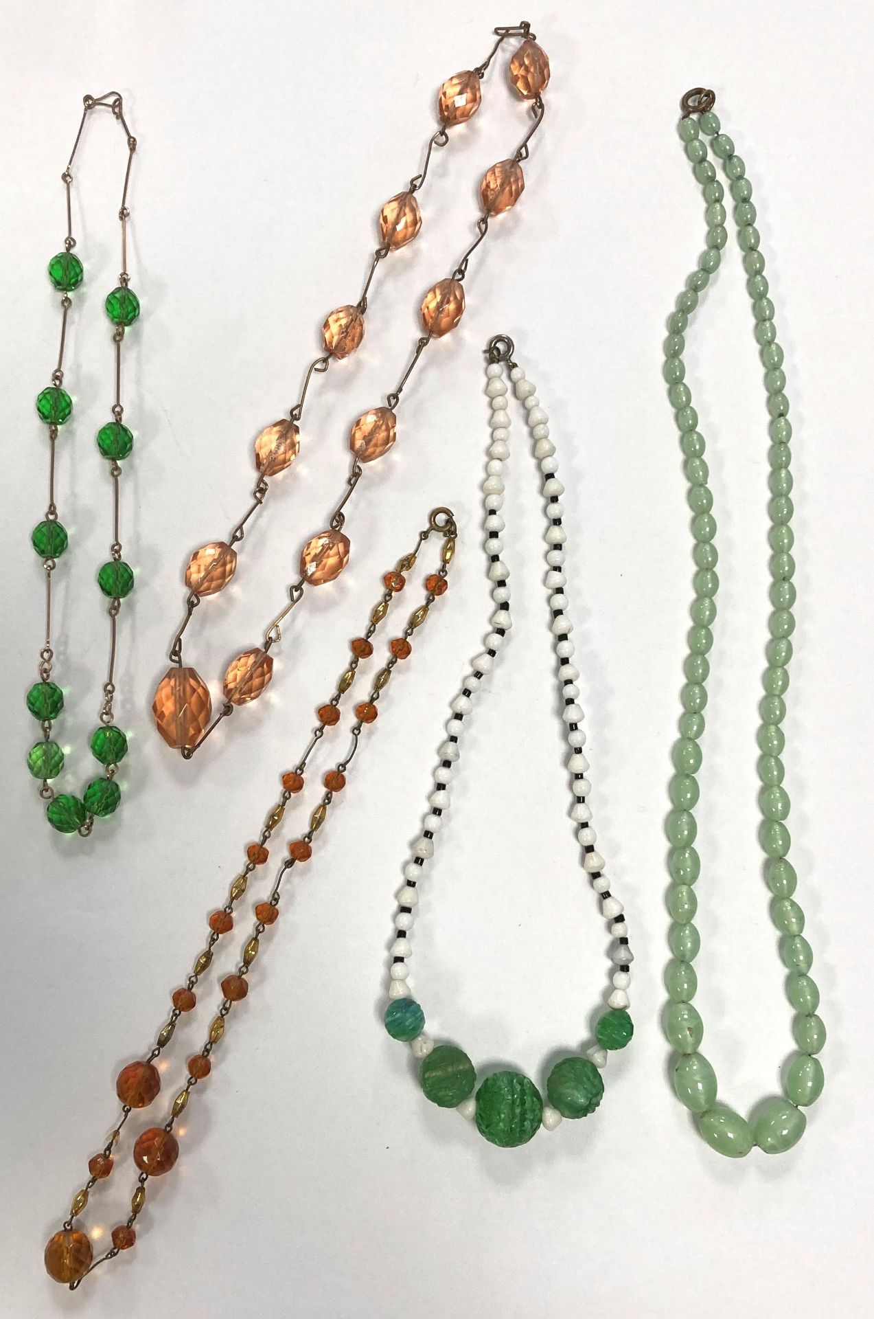A collection of Vintage/Antique glass necklaces including,