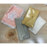 A bundle of pastel coloured bags and accessories including, two clutch bags,