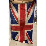 Union Jack flag, approximately 138cm x 210cm, in distressed condition,