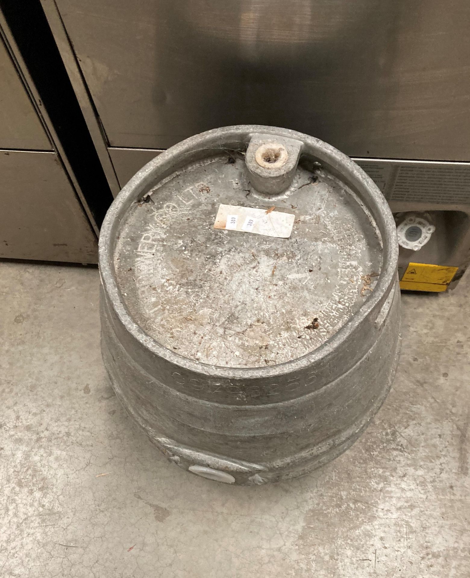 Two hand beer pumps and a keg containing out of date beer/lager - stamped "property of Mansfield - Image 2 of 2