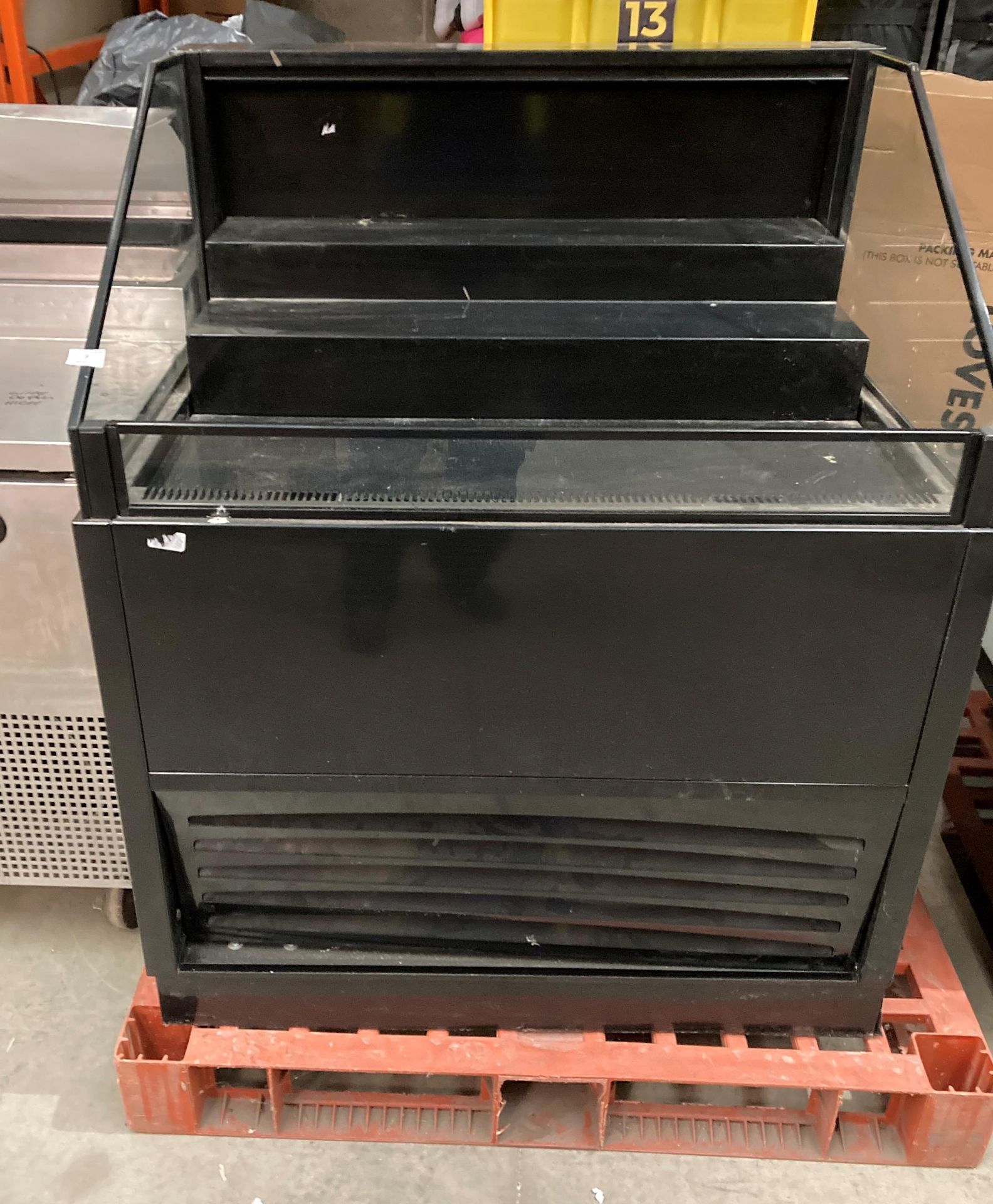 Three tier chiller display cabinet complete with glass sides and front open top in black metal