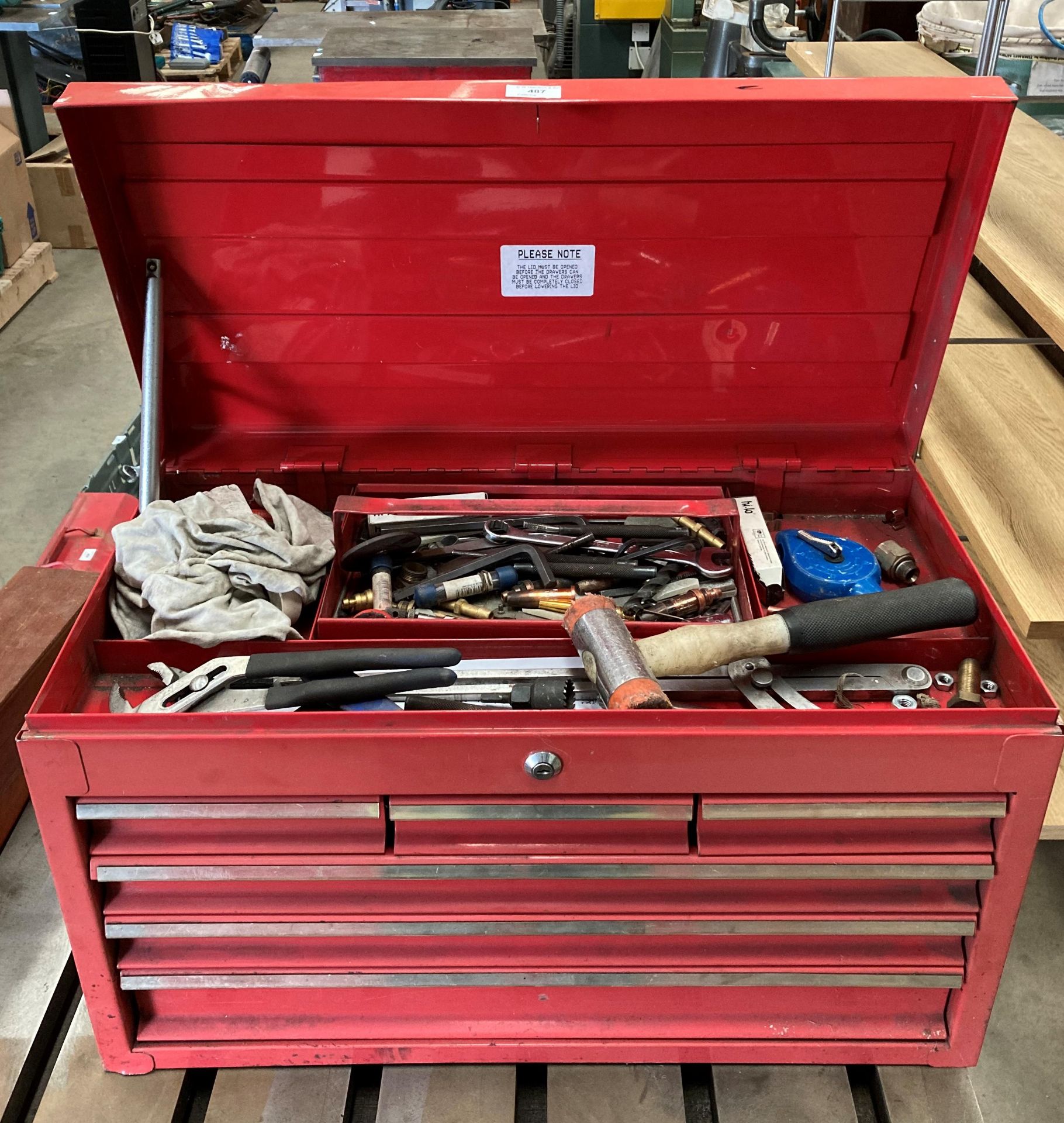 Red metal six-drawer with lift top tool box with carrying handles and contents - assorted hand