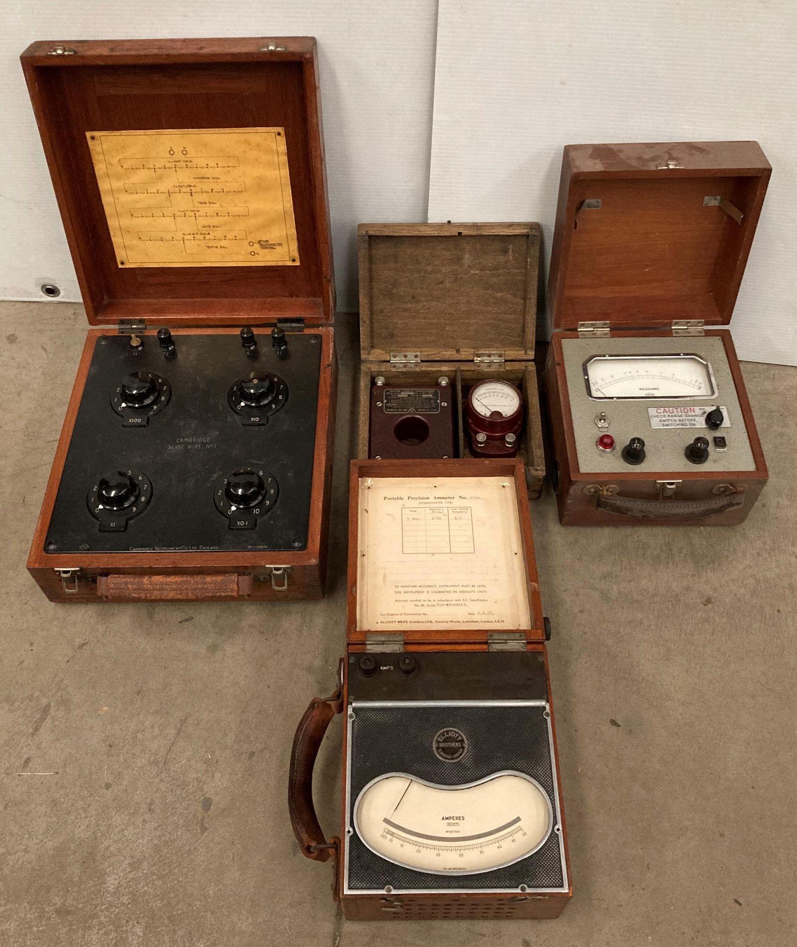 Four assorted vintage testing instruments including Weston current transformer model 539 in