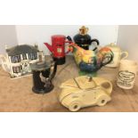 Eight items including six teapots - Cockerel 17cm high, Post Office pillar box 18cm high,