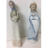 Two female figurines 27cm high (repair to neck of goose) (saleroom location: W11)