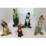 Box containing five clown figurines from 12 to 19cm high (saleroom location: J05)