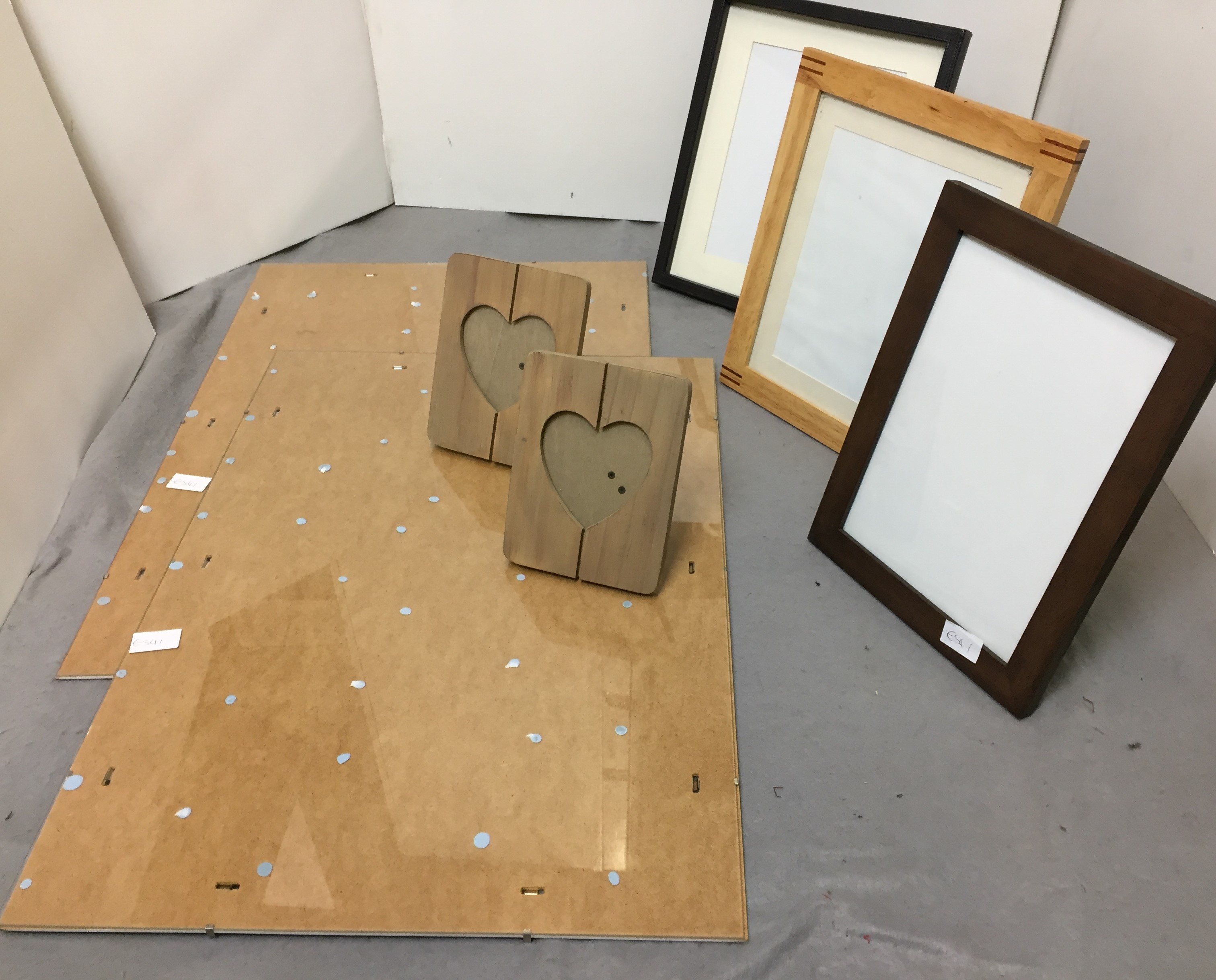 Seven picture frames including two poster mounts 70 x 50cm and five photo frames from 20 x 15 to 17