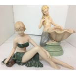 Two composite Art Deco figures - reclining lady 27 x 17cm high (missing part of skirt tail) and