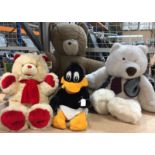 Four soft toys including Halsall Koochie Christmas bear 54cm high, Allders white bear 70cm high,
