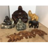 Six items including three composite buddhas Leonardo Collection 14cm high and brown wood effect