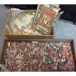 Wooden drawer and box containing terracotta architectural model-building pieces with plans and