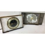 Two Metamec battery clocks both brass and marble effect smallest 15 x 21cm with white background