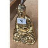 Small heavy brass Buddha,