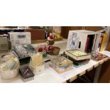 Contents to end of rack - assorted books, table mat sets,