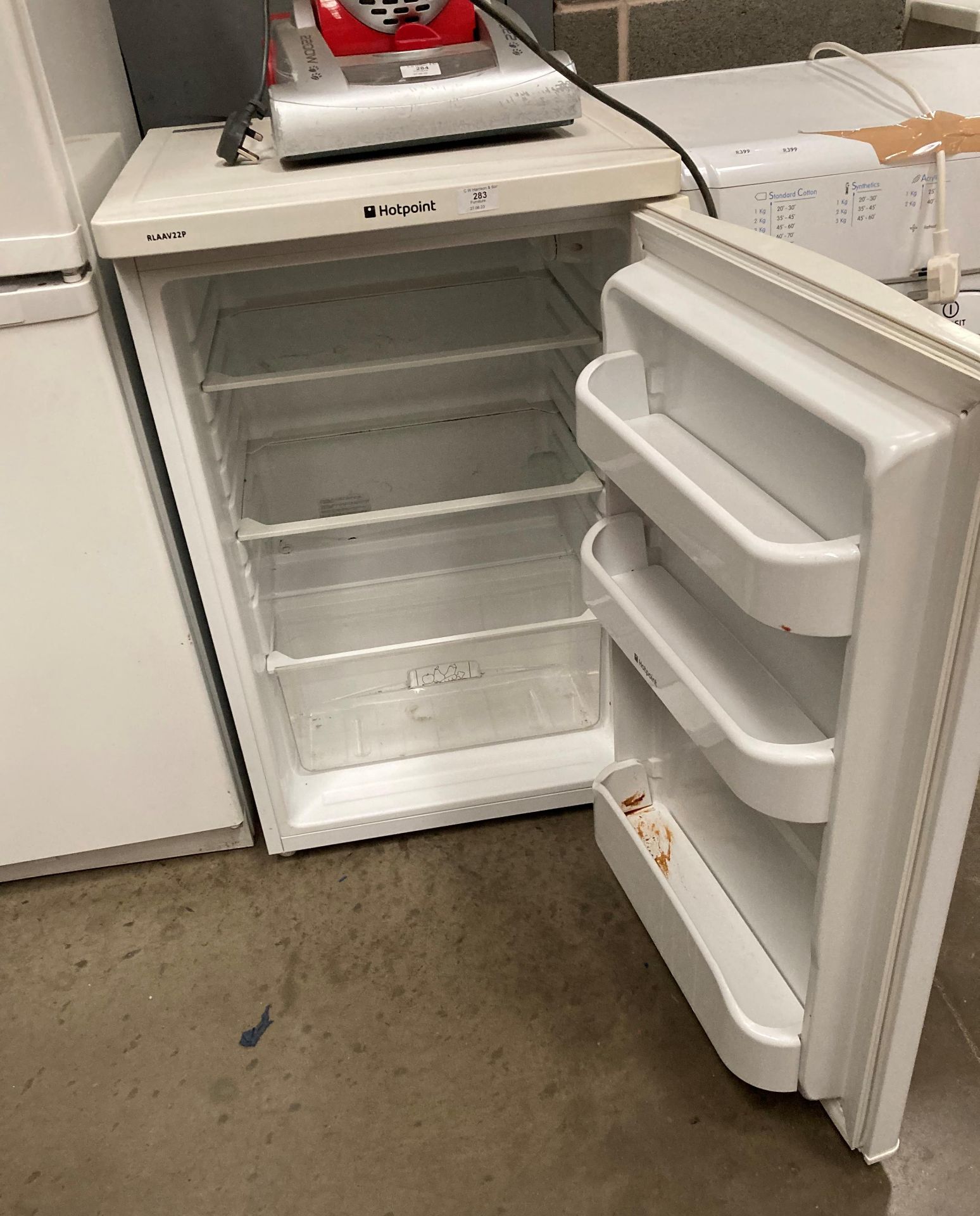 A Hotpoint ICAAV22P under counter fridge (Saleroom location: PO)