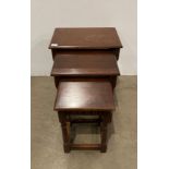 Dark oak nest of three tables (saleroom location: MA7)