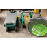 A Zag Move and Groove plastic garden cart,