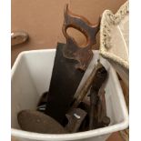 Contents to small bin handsaw, G Clamp, last etc.