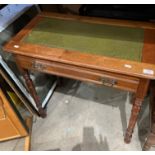 A mahogany single drawer side table with green tooled leather finish top,