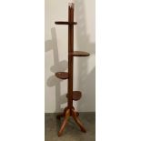 Tall teak plant stand in Arts & Crafts style,