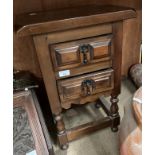 A small wood two drawer side table,