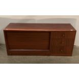 Mahogany finish wall unit comprising three drawers and fall front bureau section with writing slope,