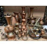 Contents to part of rack - a quantity of copper jugs, pans etc.