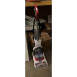 A Vax Compact Power Plus Heat Blast upright carpet shampooer (Saleroom location: PO)