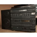 A Sanyo stacking system complete with one speaker (saleroom location: S2 ENT)