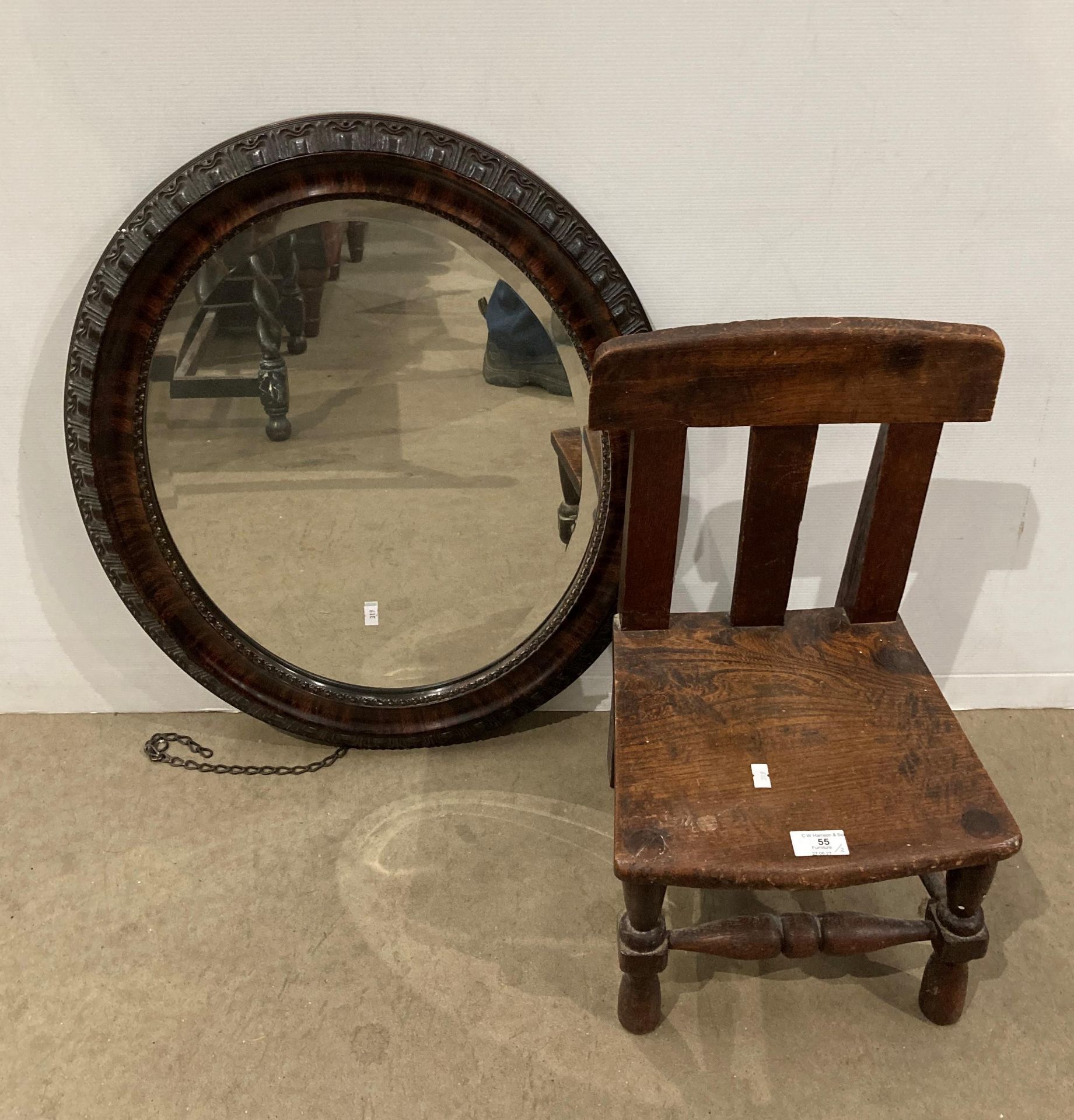 Two items - a small child's oak chair on turned legs and supports and a carved mahogany oval wall