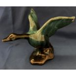 Vintage Blue Mountain pottery goose taking flight,