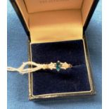 9ct [stamped: 375] gold diamond and blue topaz ring, size Q. Weight - 1.