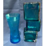 A Whitefriars 'Drunken Bricklayer' vase in turquoise glass (21cm high) and an Alsterfors blue glass