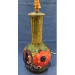 Moorcroft table lamp in green with floral design, signed to base WM (no shade),