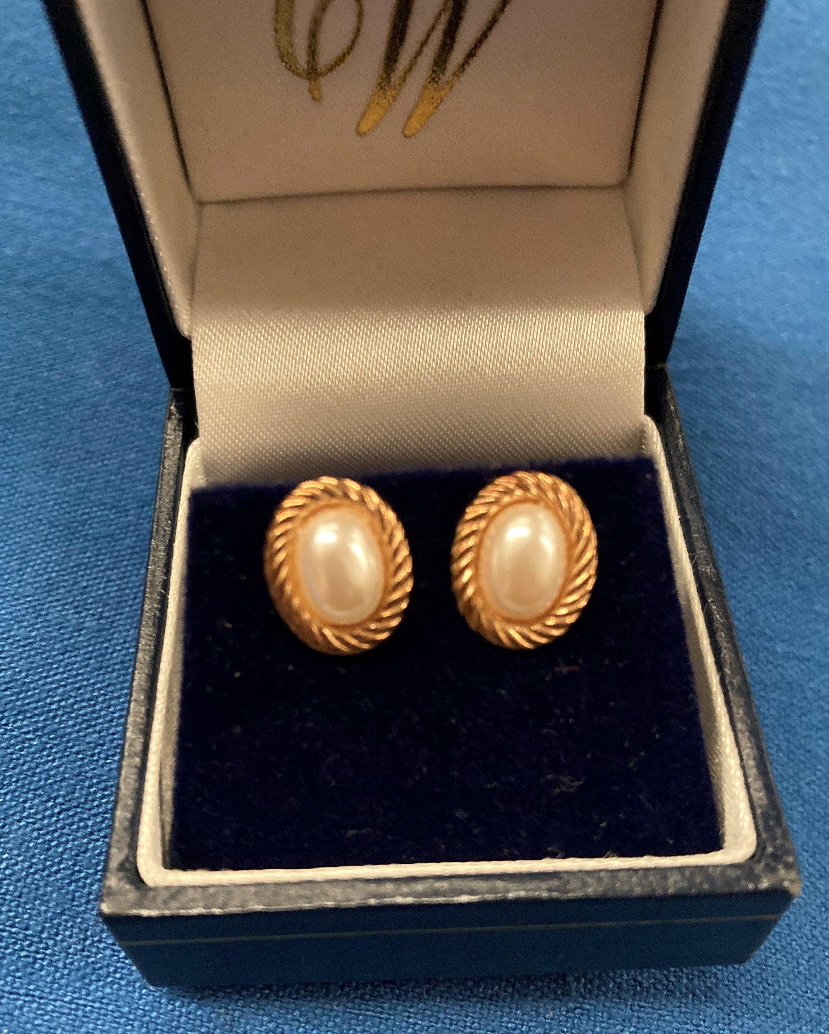 A pair of faux pearl and gold-plated (possibly) earrings without backs (boxed) (saleroom location: