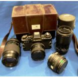 Rolleiflex SL35E camera with a Rolleinar-MC 55mm lens, Makinon 28mm lens, Rolleinar-MC 135mm lens,