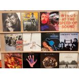 Contents to vinyl record case - sixteen albums featuring mainly Paul McCartney and Wings but also