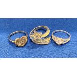 Three assorted Sterling Silver [stamped: 925] dress rings, sizes P,