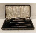 Cased six-piece silver handled [hallmarked] manicure set by W Greenwood & Sons, Birmingham 1922.
