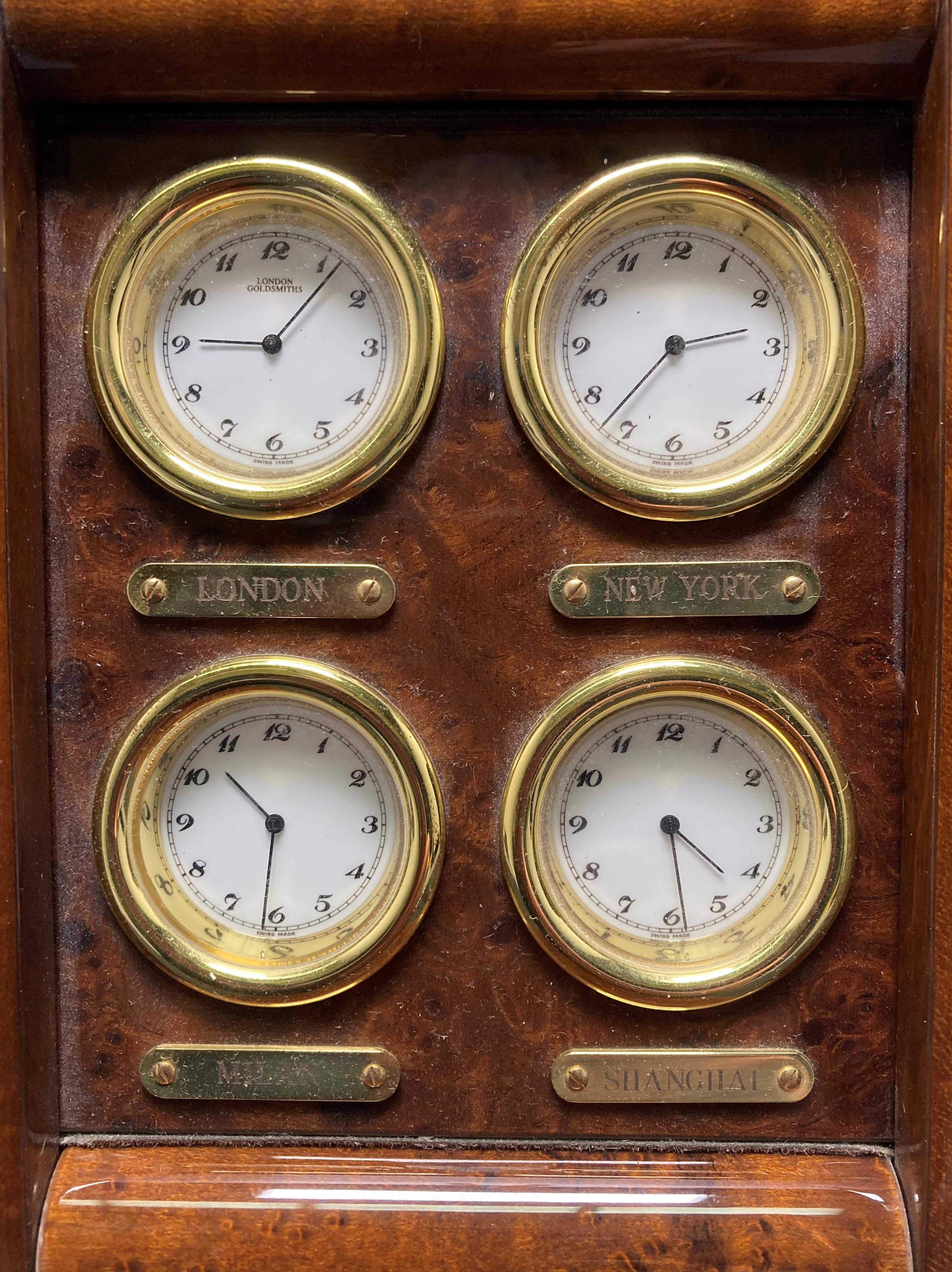 The London Goldsmiths Company world clock in a lacquered wood finish with time of London, New York, - Image 2 of 4
