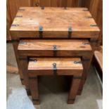 Wooden nest of three tables with metal side supports (saleroom location: MA3)