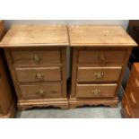 Pair of three drawer pine bedside cabinets with brass handles (saleroom location: MA5/4)