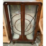 Art Deco mahogany china cabinet with internal glass shelves on claw and ball feet with loose trim,