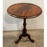 Walnut circular wine table on a tripod base with turned column and scroll feet - 54cm diameter x